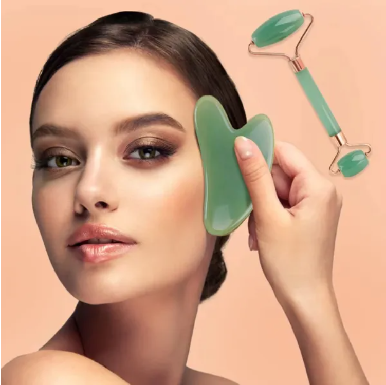 Woman using Zyra Sculpt Duo gua sha and facial roller